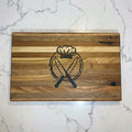 Wooden cutting board with a bread and knife design on a marble surface