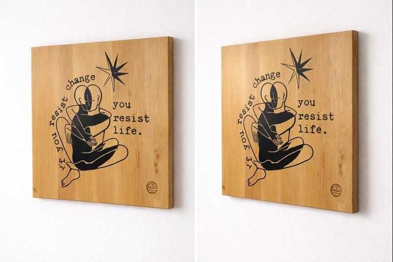 Wooden wall art with a black silhouette and motivational quote on a white background