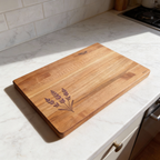 Wooden cutting board with laser engraving on a kitchen counter