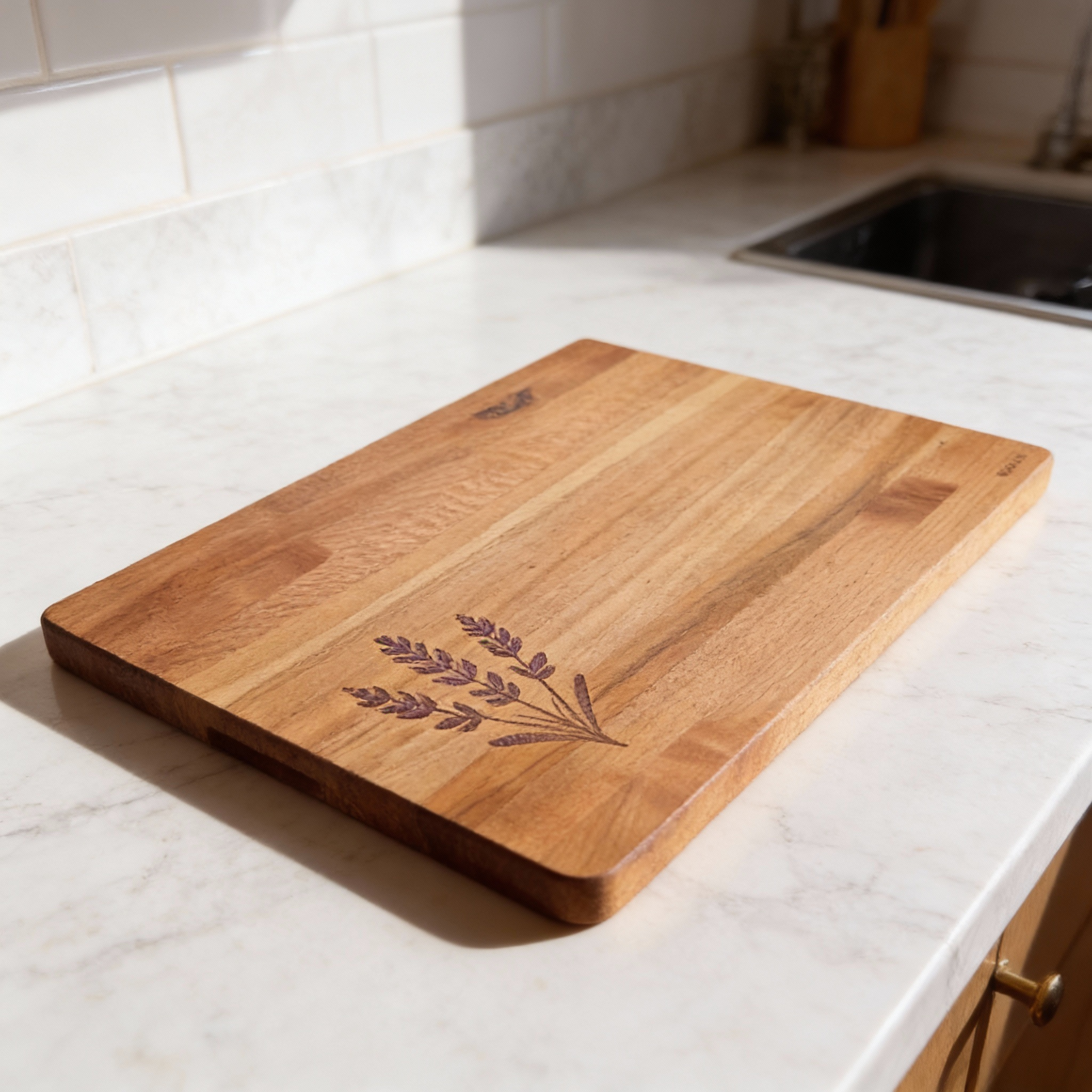 Wooden cutting board with laser engraving on a kitchen counter